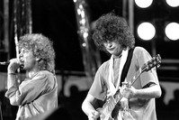 In this July 13, 1985 file photo, singer Robert Plant, left, and guitarist Jimmy Page of the British rock band Led Zeppelin perform at the Live Aid concert at Philadelphia's J.F.K. Stadium. (AP Photo)