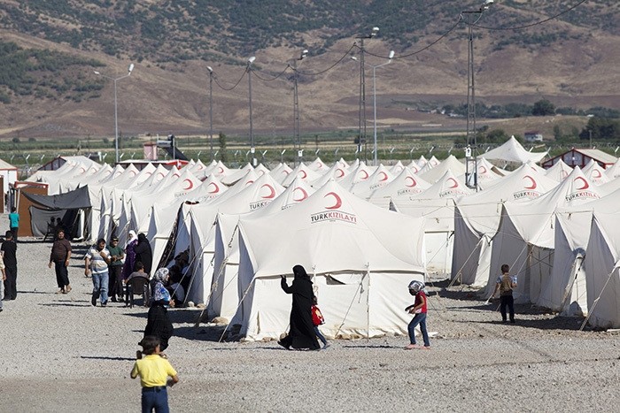 Syrian refugees at the Islahiye refugee camp in Hatay, Turkey 04 July 2012. One of eight refugee camps set up by Turkey and run by the Turkish Red Crescent to take refugees from the current conflict in Syria. (EPA Photo)