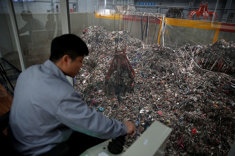 An employee works inside a newly launched waste-to-energy plant by Suzhou Wujiang Everbright Environmental Energy Ltd in Wujiang of Suzhou, Jiangsu province, China (Reuters Photo)