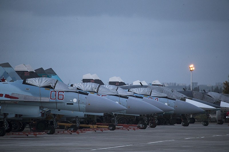 Russian fighter jets and bombers are parked at Hemeimeem air base in Syria, March 4, 2016. (AP)