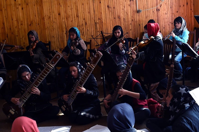 In this photograph taken on January 8, 2017, Afghan music students play during a rehearsal at The Afghanistan National Institute of Music in Kabul. (AFP Photo)