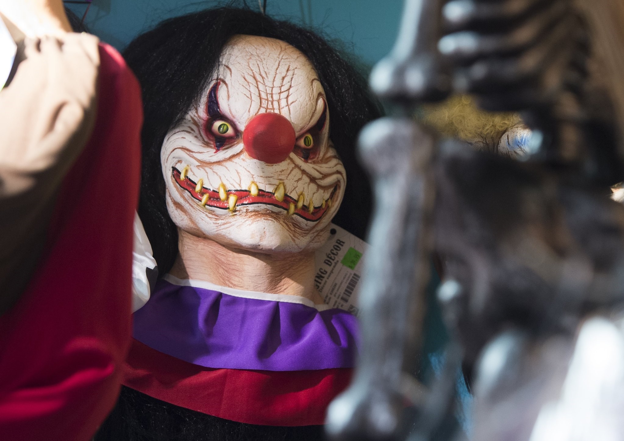 Halloween costumes and props, including a ,scary, clown mask, are seen for sale at Total Party, a party store, in Arlington, Virginia, October 7, 2016. (AFP Photo)