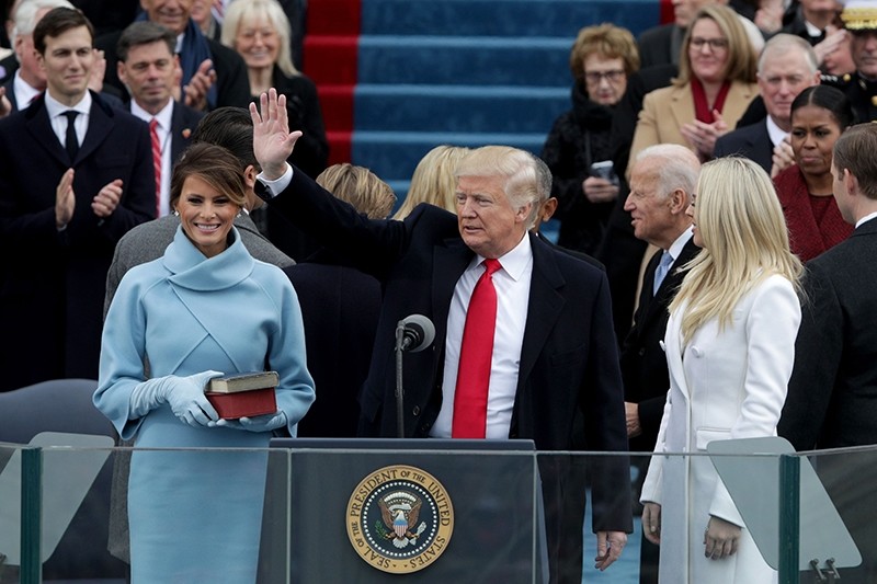 President Trump waves after he is sworn into office on the West Front of the U.S. Capitol on January 20, 2017 in Washington, DC. (AFP Photo)