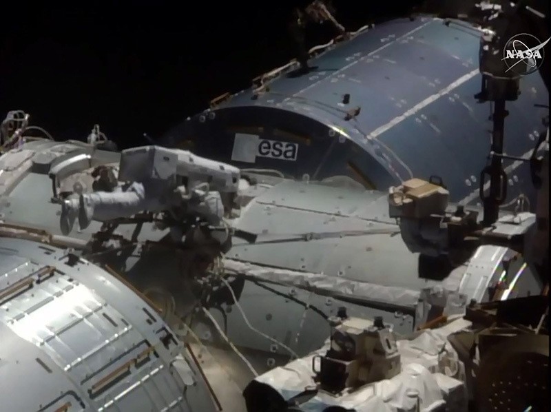 This NASA TV video grab shows US astronaut Kate Rubins viewed near the docking port on August 19, 2016 at the International Space Station. (AFP Photo / NASA TV)