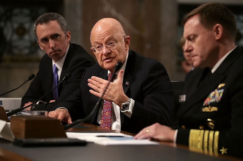 USD Marcell Lettre II, DNI James Clapper and USCYBERCOM Director Admiral Michael Rogers testify before the Senate Armed Services Committee January 5, 2017 in Washington, DC. (AFP Photo)
