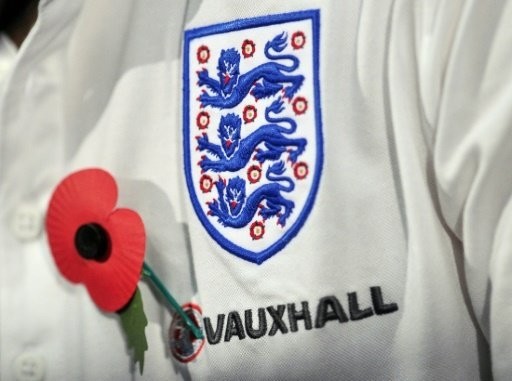 The Sun said FIFA had refused to let England and Scotland display poppies on their shirts during the game because it would be a political statement. (AFP Photo)