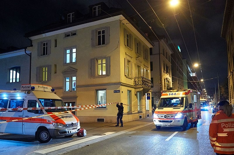Ambulance and police cars are seen outside a Muslim prayer hall, central Zurich, on December 19, 2016, after three people were injured by gunfire. (AFP Photo)