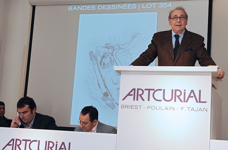 This file photo taken on November 22, 2008 shows an auctioneer leading an auction presenting comic-books by French Jean Graton at the Artcurial auction house in Paris (AFP Photo)