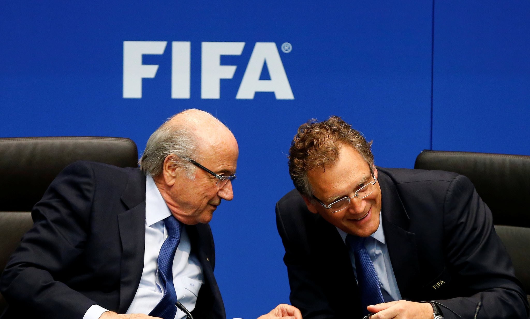FIFA President Sepp Blatter (L) talks to FIFA Secretary General Jerome Valcke during a news conference after a meeting of the FIFA executive committee in Zurich March 21, 2014. (REUTERS Photo)