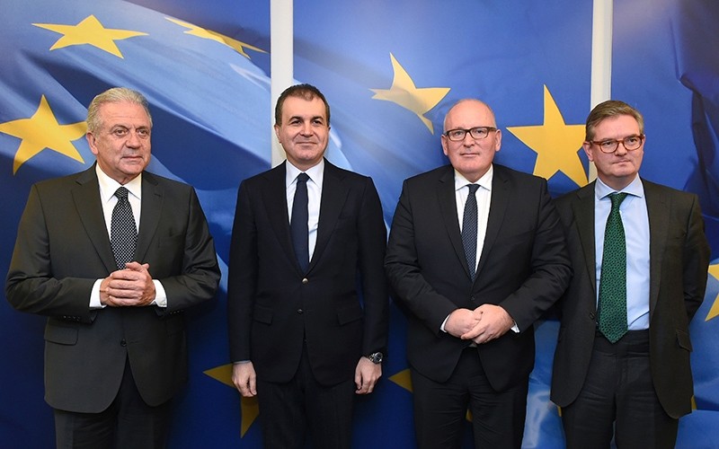 EU Commissioner of Migration Avramopoulos,Turkey's EU Minister u00c7elik, EU Commission First Vice-President Timmermans and EU Commissioner for Security Union King at the EU headquarters in Brussels on November 30, 2016. (AFP Photo)