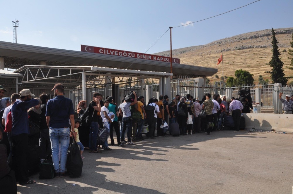 Syrians flocked to the Cilvegu00f6zu00fc border crossing on Thursday.