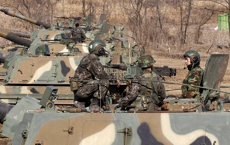 South Korean Army soldiers sit on their K-9 self-propelled artillery. (AP Photo)