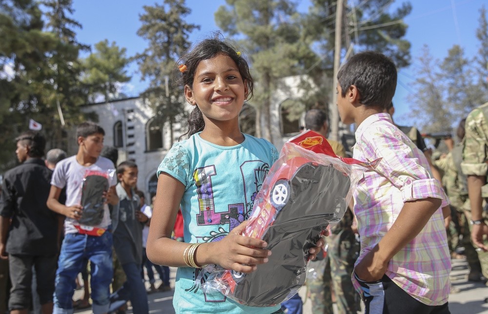 Toys were distributed to children in Jarablus. After the border town was cleared of DAESH after Turkey's Operation Euphrates Shield, people celebrated Qurban Bayram in their hometown after nearly three years away.