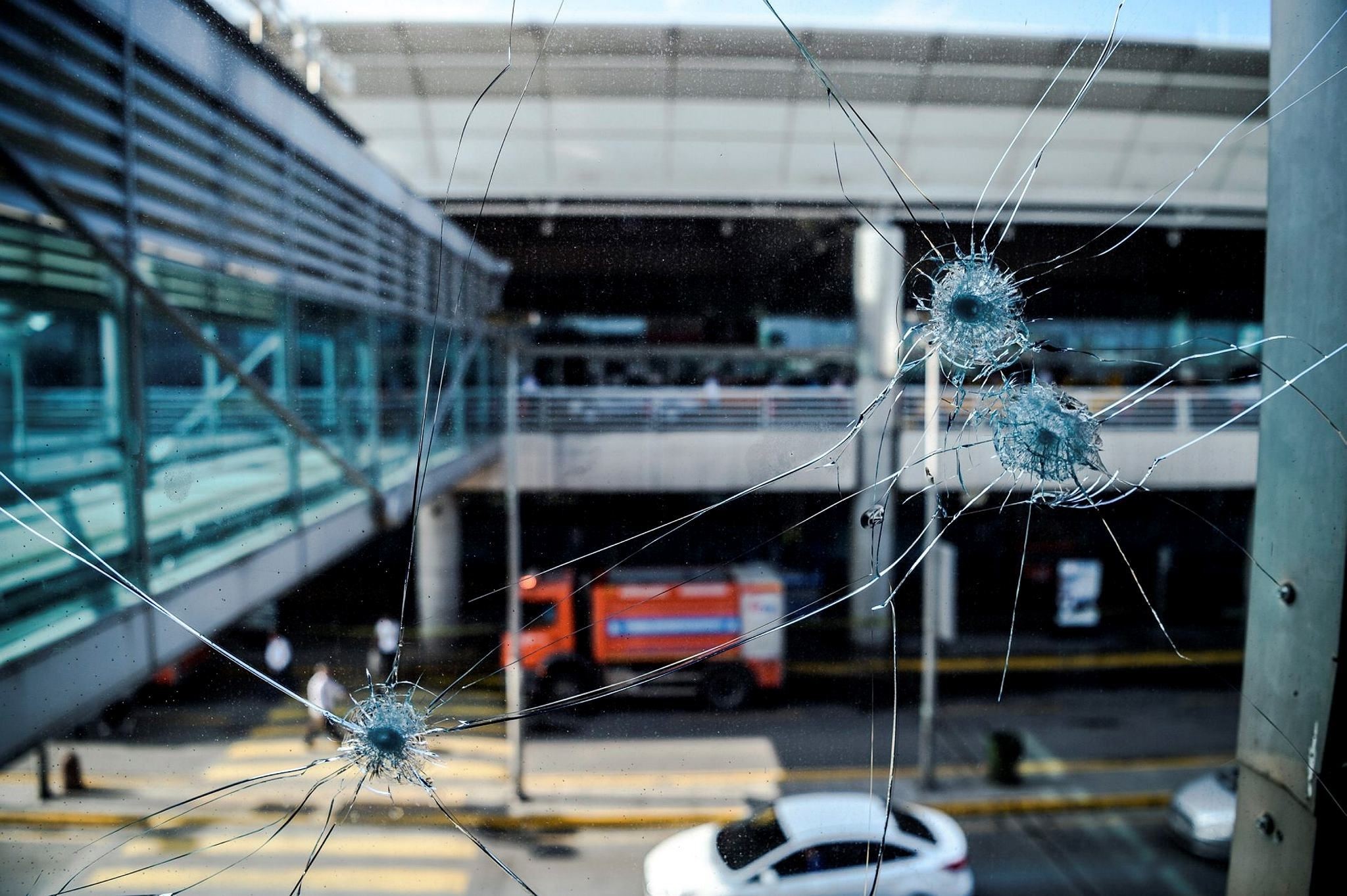 Bullet impacts are pictured at Ataturk airport's International airport on June 29, 2016, a day after a suicide bombing and gun attack targeted Istanbul's airport, killing at least 36 people. (AFP PHoto)