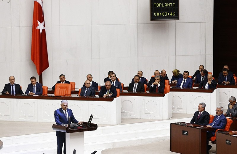 Prime Minister Binali Yu0131ldu0131ru0131m (center) at the Grand National Assembly of Turkey (AA Photo)