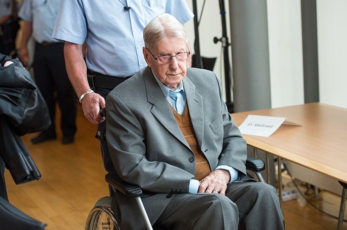 In this Saturday June 11, 2016 file photo, 94-year-old former SS guard at the Auschwitz death camp Reinhold Hanning, arrives at a courtroom in Detmold, Germany. (AP Photo)