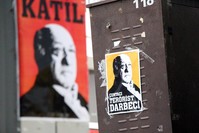 ,Killer, says the poster on the left and ,Putschist, Terrorist, on the right for FETu00d6 leader Fethullah Gu00fclen.