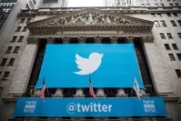 This file photo taken on November 6, 2013 shows the Twitter logo displayed on a banner outside the New York Stock Exchange (NYSE) in New York. (AFP Photo)