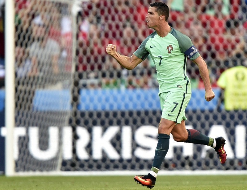 Cristiano Ronaldo of Portugal celebrates after scoring a goal during the UEFA EURO 2016 group F preliminary round match between Hungary and Portugal at Stade de Lyon in Lyon, France, 22 June 2016 (EPA Photo)