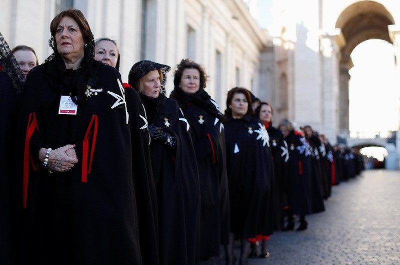 Members of the Order of the Knights of Malta arrive in St. Peter Basilica for their 900th anniversary at the Vatican February 9, 2013. (Reuters Photo)
