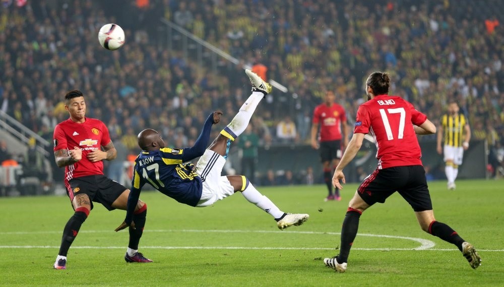 Moussa Sow (C) scores the 1-0 under defense of Manchester Unitedu2019s Marcos Rojo (L) and Daley Blind at the UEFA Europa League group A match. 