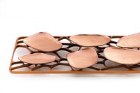 A total of five artists/designers and four craftsmen participated in the project. Designer Atilla Kuzu works with copper.