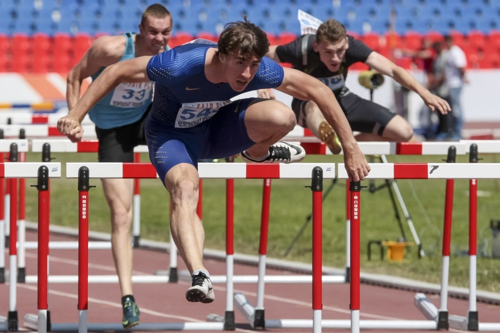 World 110-meter champion Sergei Shubenkov competes at the National track and field championships at a stadium in Cheboksary.