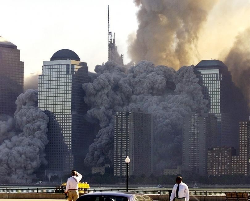 The remaining tower of New York's World Trade Center dissolves in a cloud of dust and debris about a half hour after the first twin tower collapsed. (REUTERS Photo)