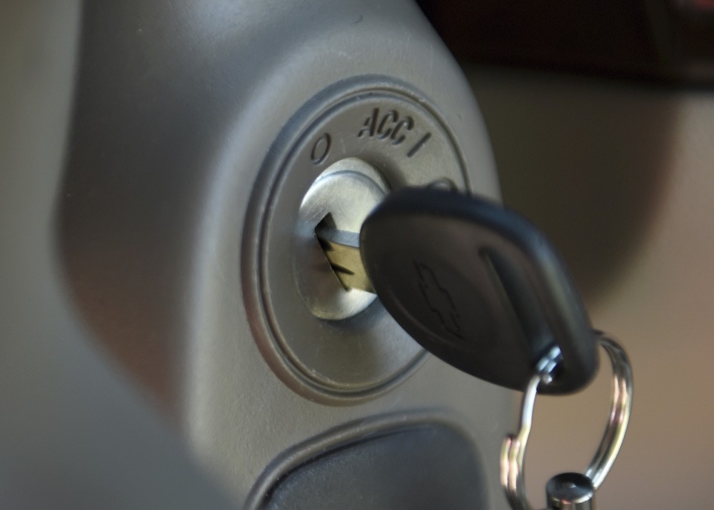 A key in the ignition switch of a 2005 Chevrolet Cobalt.