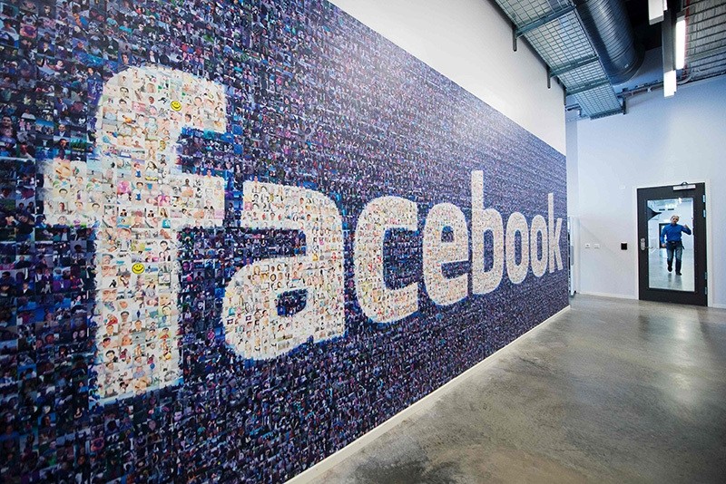 This file photo taken on Nov. 7, 2013 shows a logo created from pictures of Facebook users worldwide is pictured in the company's Data Center, its first outside the US in Lulea, in Swedish Lapland. (AFP Photo)