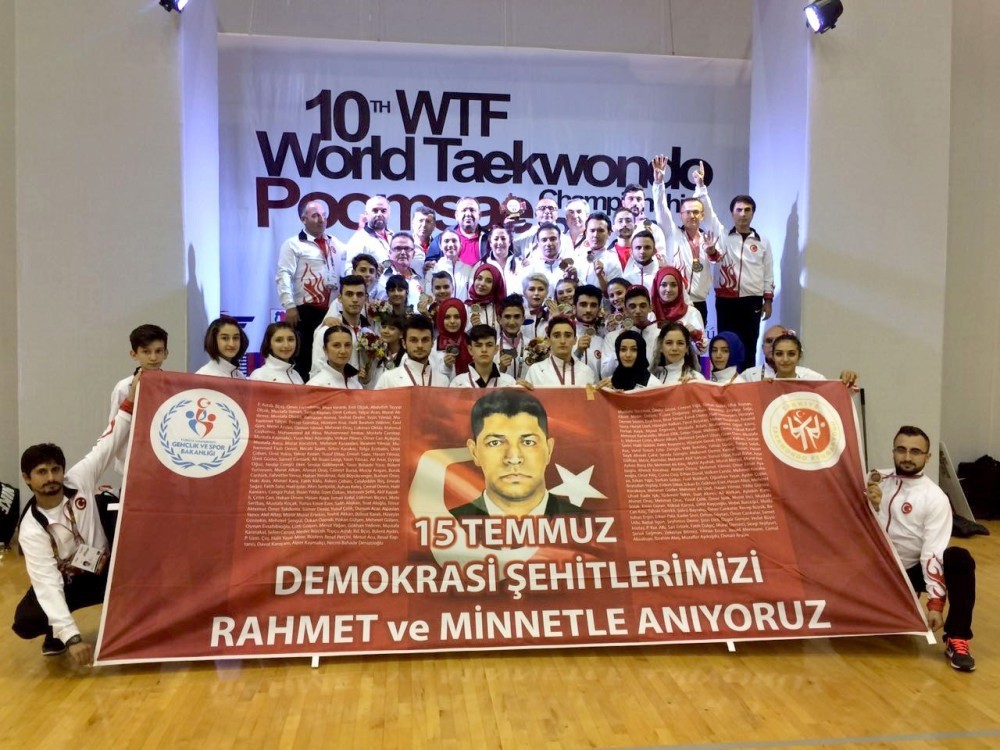 Turkey's world's second-ranked Taekwondo Poomse team commemorated the martyrs Turkey lost during the foiled coup attempt on July 15. The team poses with a banner of the late sergeant u00d6mer Halisdemir, who was killed by coup plotters in Ankara.