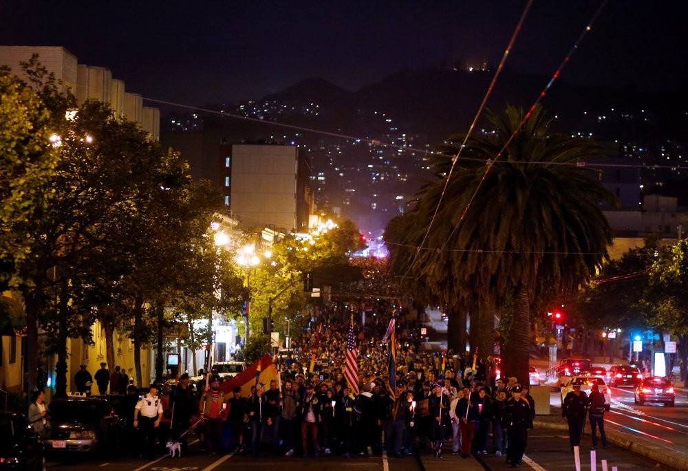 People marching down Market Street during a candlelight vigil for the victims of the Orlando attack on a gay nightclub, held in San Franciso on June 12, 2016.