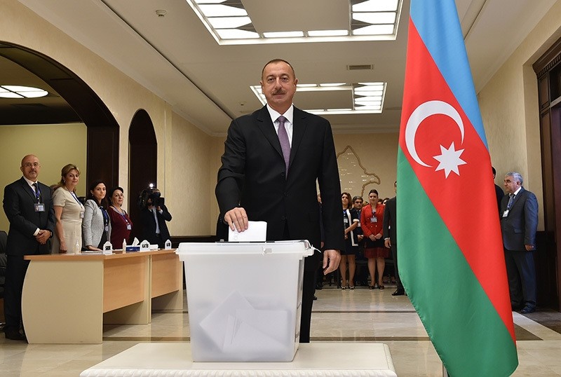 Azerbaijani President Ilham Aliyev casts his ballot at a polling station during a referendum in Baku, Azerbaijan on Monday, Sept. 26, 2016. (AP Photo)
