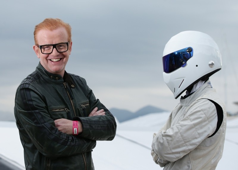 Chris Evans, left, standing with ,The Stig, in Cannes, France. Host Chris Evans has announced Monday July 4, 2016, that he is quitting the BBCu2019s flagship car show u201cTop Gearu201d  AP Photo