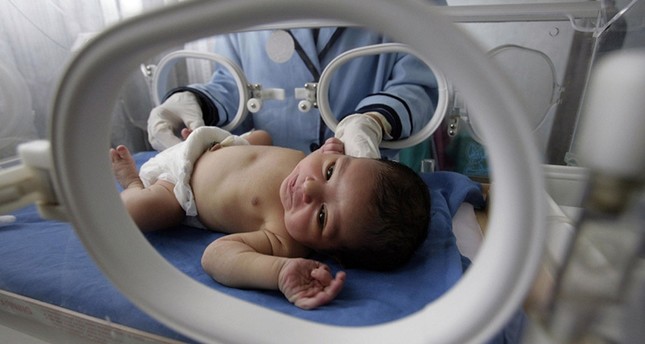 Image result for World’s first baby born with new  the 3 parent technique