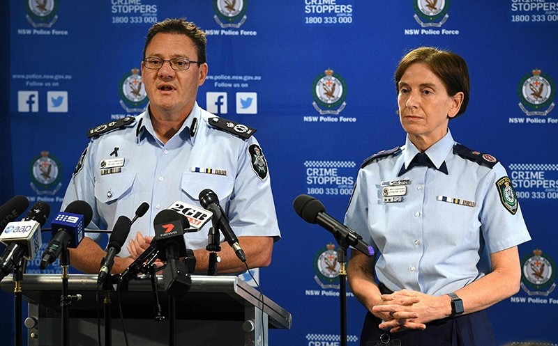Australian Federal Police Deputy Commissioner Michael Phelan (L) and New South Wales Police Commissioner Catherine Burn address the media after two 16-year-old boys were charged with terror-related offences in Sydney (AFP Photo)