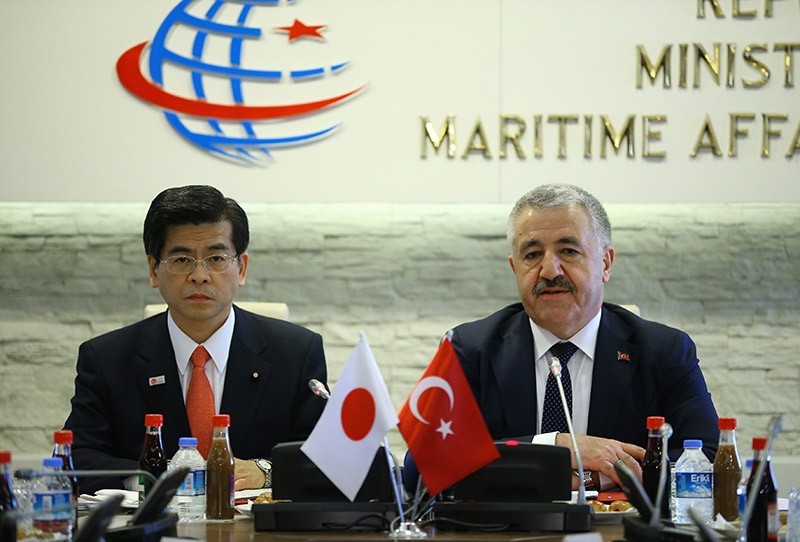 Turkish Minister of transport, maritime affairs and communication Ahmet Arslan (R) with his Japanese counterpart. Jan. 18, 2017. (AA Photo)