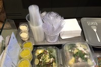 Plastic glasses, knives, forks and food boxes are pictured in a takeaway restaurant in Paris Tuesday, Sept. 6, 2016. (AP Photo)