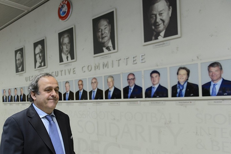 UEFA President Michel Platini, arrives for the draw of the round of 16 of the UEFA Europa League 2014/15 at the UEFA Headquarters, in Nyon, Switzerland, Friday, February 27, 2015. (EPA Photo)