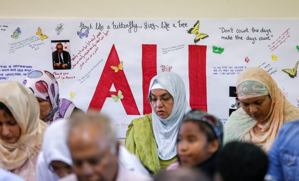 People pray during the Memorial Service at the Louisville Islamic Center for the late Muhammad Ali in Louisville, Kentucky.