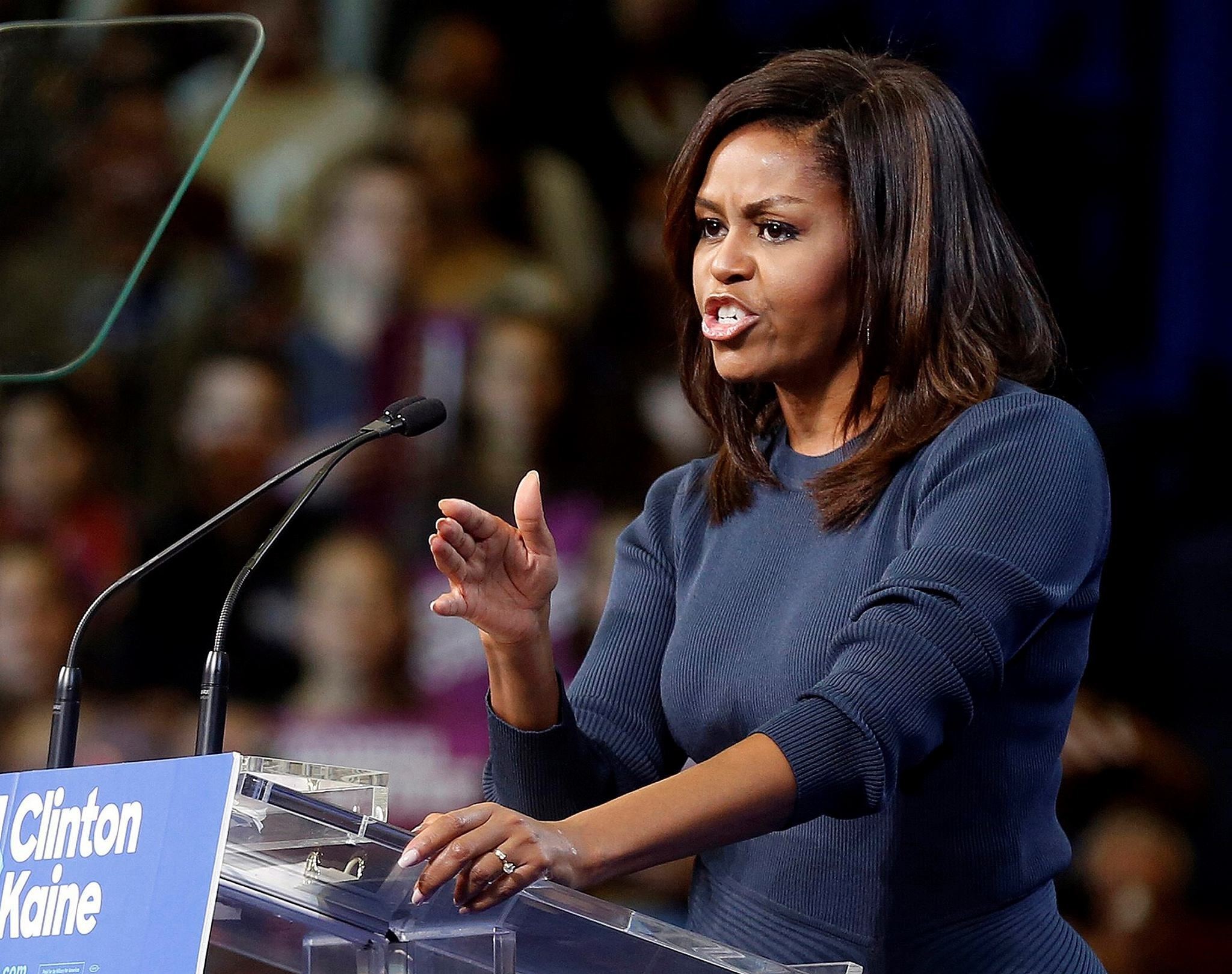 First lady Michelle Obama speaks during a campaign rally for Democratic presidential candidate Hillary Clinton Thursday, Oct. 13, 2016, in Manchester, N.H. (AP Photo)