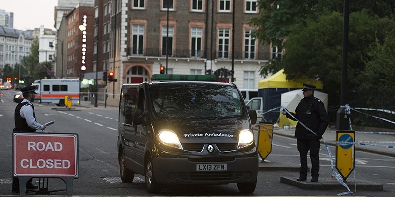  A private ambulance drives away from the scene where one women died and several were injured in a suspected knife attack in Russell Square, Central London, Britain (EPA Photo)
