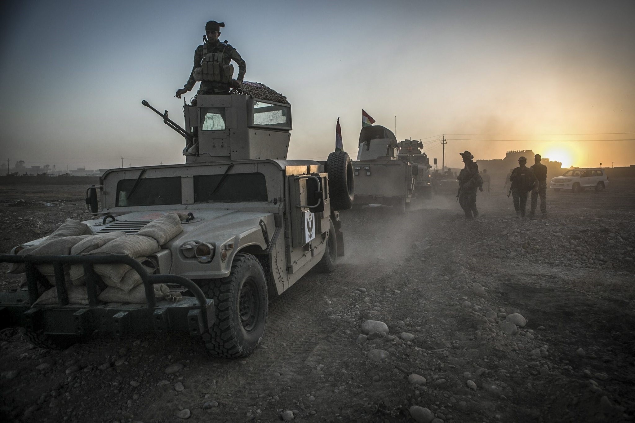 Peshmerga forces leave a base as they take part in an operation to liberate several villages currently under the control of the Islamic State southeast of Mosul, north Iraq, 14 August 2016. (EPA Photo)