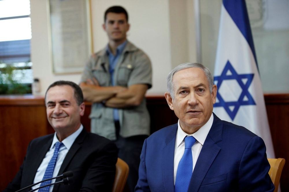 Israel's Prime Minister Benjamin Netanyahu, right, and Transportation Minister Yisrael Katz.
