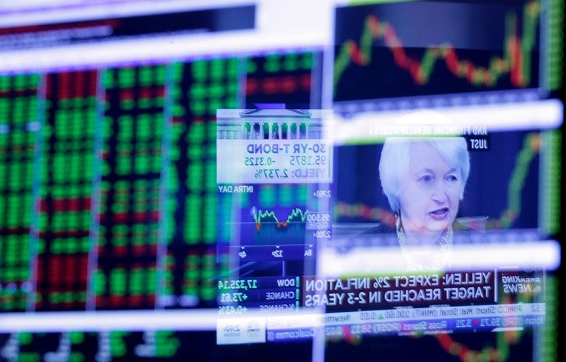 In this Wednesday, March 16, 2016, file photo, the Washington news conference of Federal Reserve Chair Janet Yellen is reflected in a specialist's screen on the floor of the New York Stock Exchange (AP Photo)
