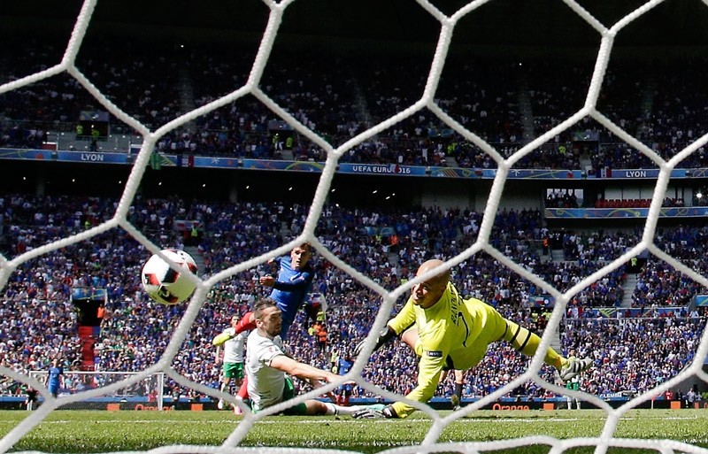 France's Antoine Griezmann scores his side's second goal during the Euro 2016 round of 16 soccer match between France and Ireland on Sunday, June 26, 2016.  AP Photo