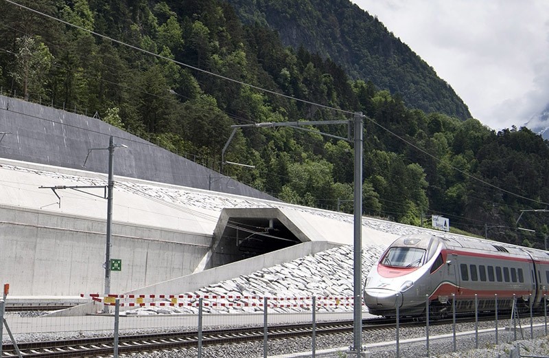 A train passes in front of the northern entrance of the Gotthard Base Tunnel on the eve of its inauguration, in Erstfeld, Canton of Uri, Switzerland, 31 May 2016 (EPA Photo)