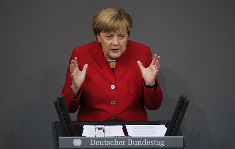 German Chancellor Angela Merkel delivers her speech during the budget 2017 debate at the German parliament Bundestag (AP Photo)