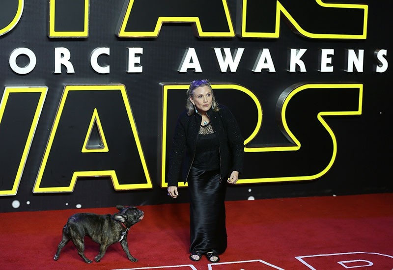 Carrie Fisher poses for cameras as she arrives at the European Premiere of Star Wars, The Force Awakens in Leicester Square, London, December 16, 2015. (Reuters Photo)