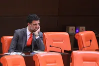 Hakan u015eu00fcku00fcr sitting on his own at Turkey's Parliament during a general assembly meeting on Feb 18, 2015, Ankara (Photo: Sabah / Ali Ekeyu0131lmaz)